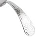 A close up of a silver Bon Chef Reflections bouillon tasting spoon with a handle.