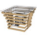 A bronze coated stainless steel metal rack with a cooking grate on a metal bar.
