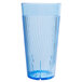 A close-up of a Thunder Group blue polycarbonate tumbler with clear liquid inside.