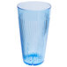 A blue Thunder Group Belize plastic tumbler with a wavy design filled with clear liquid.