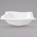 A Villeroy & Boch white bowl with a curved edge.