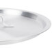 A silver aluminum Vollrath Arkadia pan cover with a white handle.