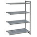 A grey metal shelf with vented shelves and a grey plastic grate with holes.