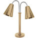 An Eastern Tabletop bronze coated stainless steel freestanding heat lamp with two adjustable cone shades.