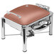 A copper coated stainless steel Eastern Tabletop induction chafer with a hinged dome cover.