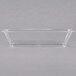 A clear plastic rectangular dish on a white surface.