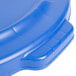 A blue plastic lid for a Rubbermaid Brute trash can.