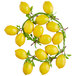 A group of decorative lemons on a rope.