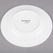 A Libbey Alpine White Porcelain Plate with black text on a white background.