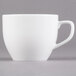 A close-up of the handle of a Libbey Alpine White Porcelain cup.