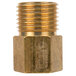 A close-up of a brass threaded male fitting with a gold tube.