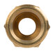 A close up of a brass threaded nut.