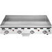 A Vulcan stainless steel countertop gas griddle with four burners.