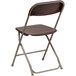 A brown Flash Furniture folding chair with a folding frame.
