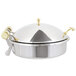 A stainless steel Vollrath Intrigue chafer with brass trim.
