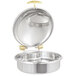 A stainless steel Vollrath food container with a brass and stainless steel lid.