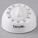 A white Taylor kitchen timer with black numbers.
