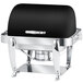 An Eastern Tabletop black rectangular stainless steel roll top chafer with chrome legs.