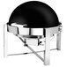 A round black and silver stainless steel roll top chafer.
