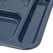A Carlisle Cafe Blue melamine tray with 6 compartments.