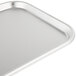 A close-up of a Vollrath stainless steel oblong serving tray.