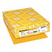 A yellow box of Astrobrights Galaxy Gold cardstock paper with white and yellow labels.