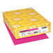 A yellow box of Astrobrights Fireball Fuchsia paper with white label.