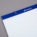 An Ampad white unruled flip chart pad.