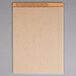 A brown paper pad with a yellow label that says "TOPS 7533 Wide Ruled Legal Pad"