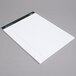 A white TOPS writing pad with lined paper.