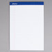 An Ampad wide ruled white writing pad with blue lines.