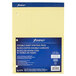 Ampad yellow law ruled writing pad with 3 holes and blue label on white background.