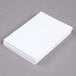 A stack of Oxford white unruled index cards.