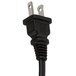 A close-up of a black plug on a black power cord.