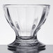 A clear glass Libbey sundae dish with a curved edge and base.
