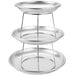 A three tiered metal seafood tower stand with small round trays on each level.