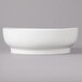 A close up of a white Bon Chef curved bowl.