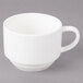 A white Bon Chef short cup with a handle on a gray surface.