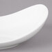 A white porcelain pasta bowl with a curved edge.