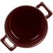 A Bon Chef burnt umber porcelain cocotte with handles on a white background.