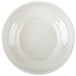 A white melamine salsa dish with a circle in the middle.
