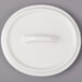 A white porcelain lid with a handle for a Bon Chef oval cocotte.