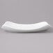 A white rectangular Bon Chef porcelain bread and butter plate with curved edges.