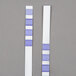 A white rectangular 3M Frying Oil Test strip with blue accents.