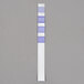 A white rectangular 3M test strip with a purple and white stripe.