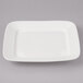 A white rectangular Bon Chef porcelain plate with a white border.