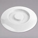 A white Thunder Group Nustone server lid with a circular hole on a white surface.