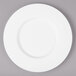 A Bon Chef white bone china bread and butter plate with a wide circular edge.