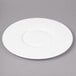 A white Bon Chef bone china plate with a wide rim on a gray surface.