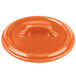 An orange Bon Chef porcelain lid with a handle.